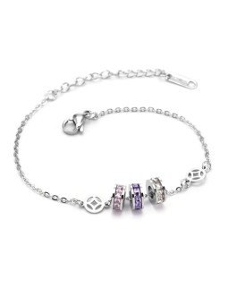 Bracciale geometrico in acciaio al titanio e zirconi placcato in oro 18k