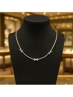 Collana donna in acciaio inossidabile minimal e lucida con tre fiocchi