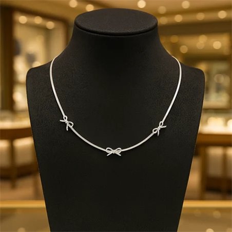 Collana donna in acciaio inossidabile minimal e lucida con tre fiocchi