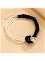 Collana Night & Day a triplo filo di perle con nodo centrale