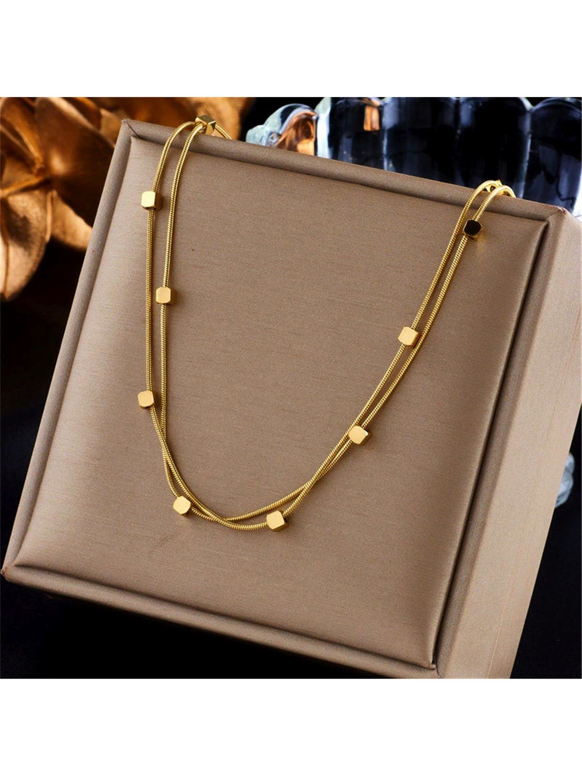 Collana Geometric Twin Doppio Filo Snake con Cubi Dorati