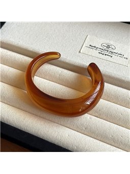 Bracciale rigido Amber Waves stile chunky in acrilico ambrato