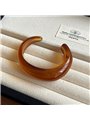 Bracciale rigido Amber Waves stile chunky in acrilico ambrato